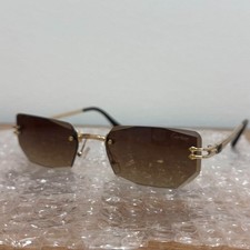 Lunettes de soleil Cartier sans monture accessoires de mode collection lunett...