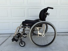 Tilite SX Titanium wheelchair , 18" wide seat .
