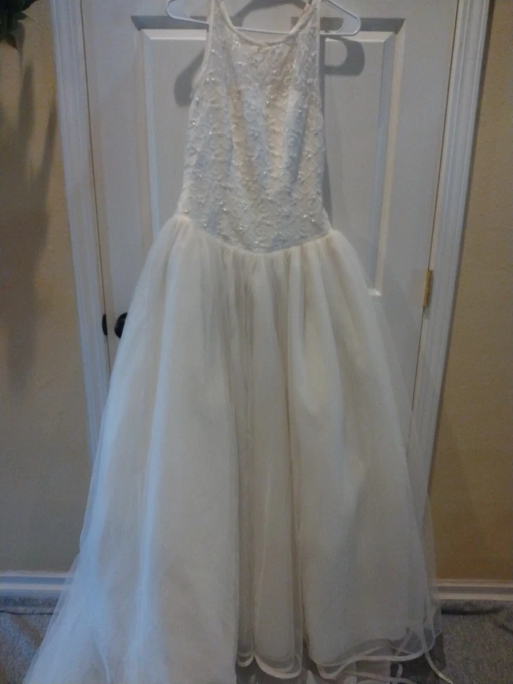 Vestido de novia jazmín sin mangas de tul talla 8 marfil en color dañado Foto 2 de 4