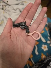 Vintage Miniature black plastic Pistol Shooter Keychain Key Ring