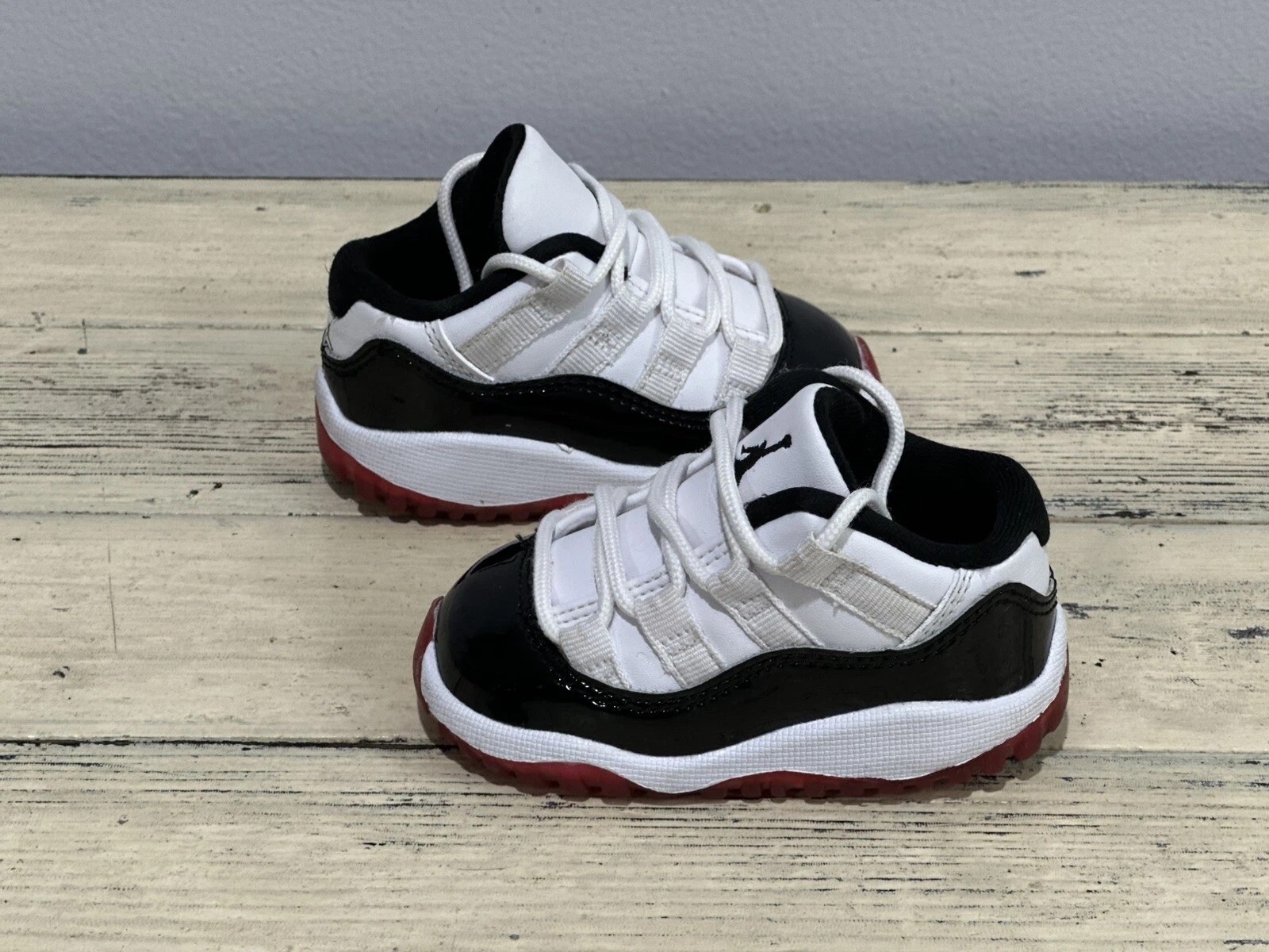 Scarpe da bambino Nike Air Jordan 11 retrò basse allevate Concord 505836 160 taglia 4C