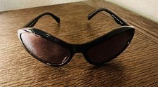 Designer Prada Women’s Black Cateye Sunglasses With Matching Lenses And UV Prote