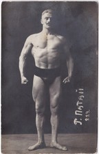 RPPC - Wrestler russo muscoloso - jockstrap quasi nudo, nero - interesse gay