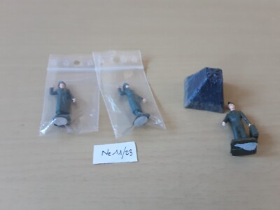 SOLIDO, 2 GERMAN OFFICER FIGURES, AN AMERICAN OFFICER, AND A TOOTH OF
