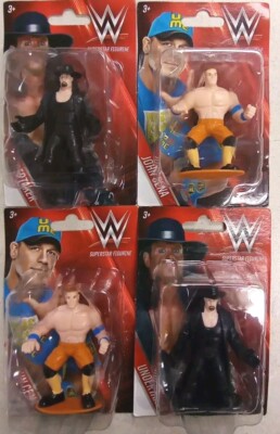 WWE 4 SUPERSTAR WRESTLING FIGURINES  JOHN CENA & UNDERTAKER COLLECT THEM ALL