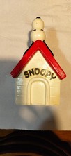Petite tirelire vintage Snoopy sur sa niche