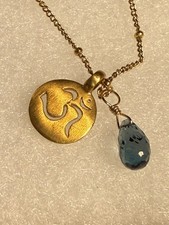 Satya Gold-Plated Om Pendant Necklace with Blue Briolette Crystal Charm