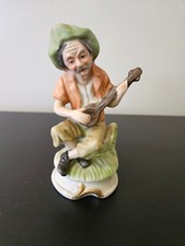Old Man Playing Guitar Figurine