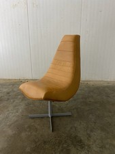 Tan Leather Curved Lounge Chair With Panel Detail