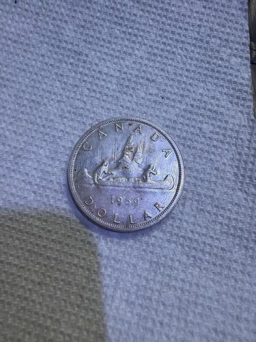 New Listing1959 Canadian Silver Dollar Coin  ( Voyageur)
