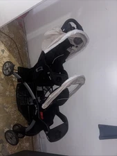 Baby Trend Sit N' Stand Travel Double Baby Stroller w/ Single Car Seat, Magnolia