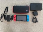 Lot Console Nintendo Switch V1. Bleu fluo et rouge avec étui et SD 256Go très bon état