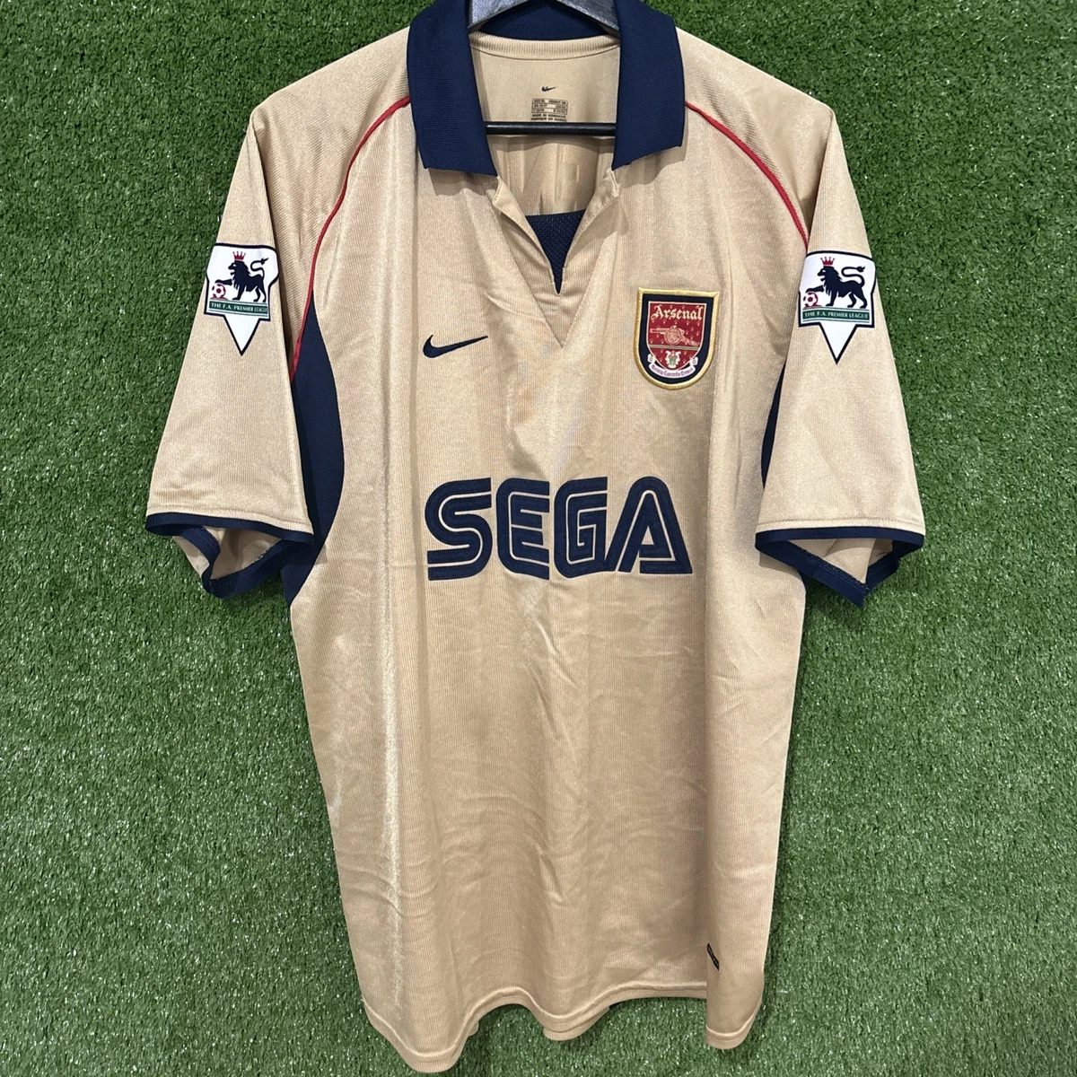 Preços baixos em Nike Arsenal Gold International Club fã de
