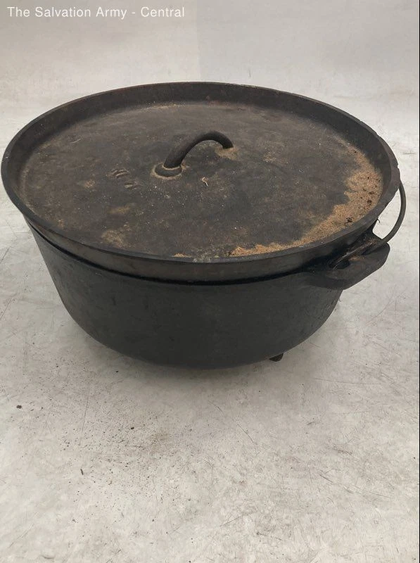 unbranded antique 14-inch round cast iron dutch oven with lid