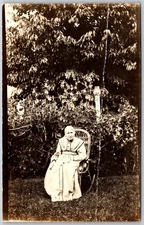 Vintage Sepia Photo Postcard Elderly Woman in Garden AZO Stamp Box