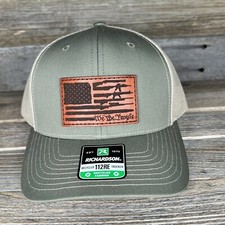 WE THE PEOPLE GUN FLAG LEATHER PATCH TRUCKER HAT
