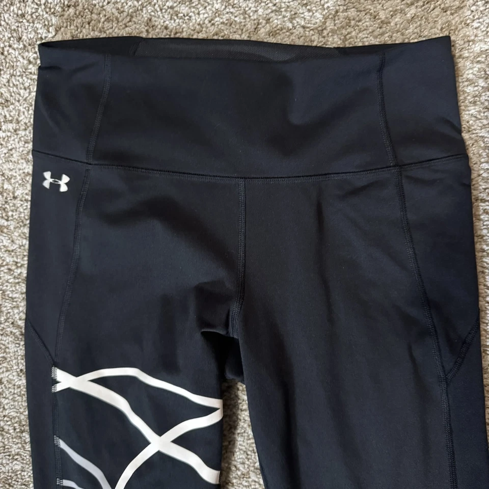Leggings Under Armour para mujer medianos negros HeatGear ajustados reflectantes ropa deportiva Foto 3 de 4