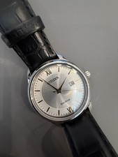 Citizen Eco-Drive Solar Quartz Date Men s Wat...