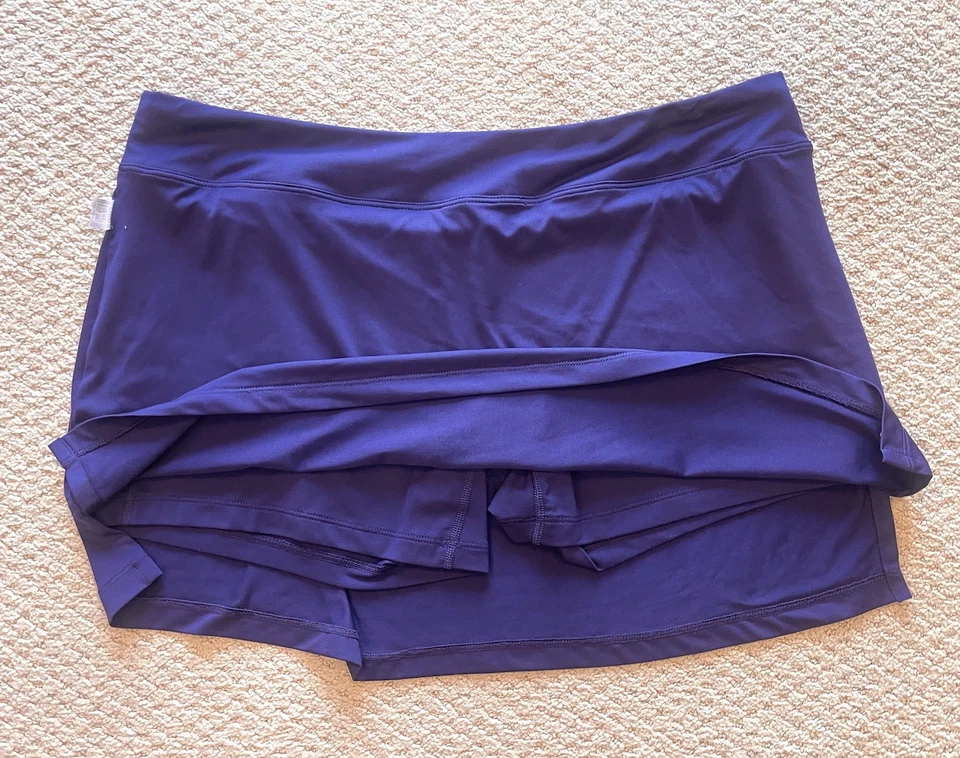 Lote de 2 faldas deportivas Nike DriFit - púrpura y rojo neón - talla XL para mujer Foto 3 de 4