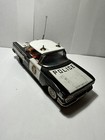 Coche de policía Chevrolet Impala de placa de hojalata - juguete de conducción por fricción años 60 18,5 cm de largo