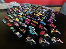 Lotto 100+ Macchinine Kinder complete di bustina e foglietto istruzioni NUOVE