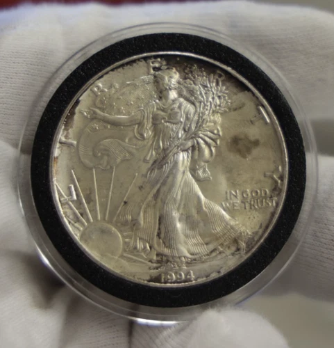 1994 US Silver Eagle $1  Better Date Stained Unc