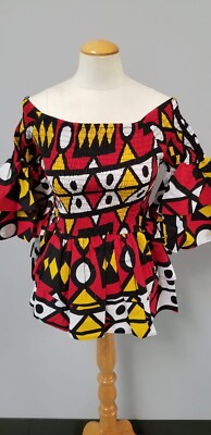Afrikanische Kleidung für Damen. Gesmoktes elastisches Oberteil.