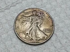 1942  Walking Liberty Half Dollars U.S 90% Silver light toning high grade coin !