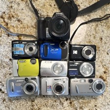 Lot of 10 Nikon, Fujifilm, Olympus ,  Digital Cameras. UNTESTED/FOR PARTS.