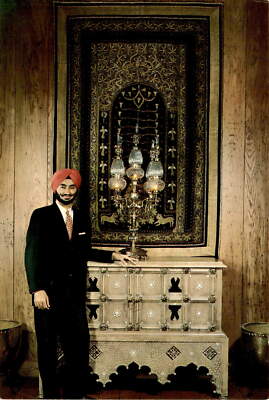 Ike Sekhon in La Tunisia with Tehran tapestry and Sultan Kazim furniture.
