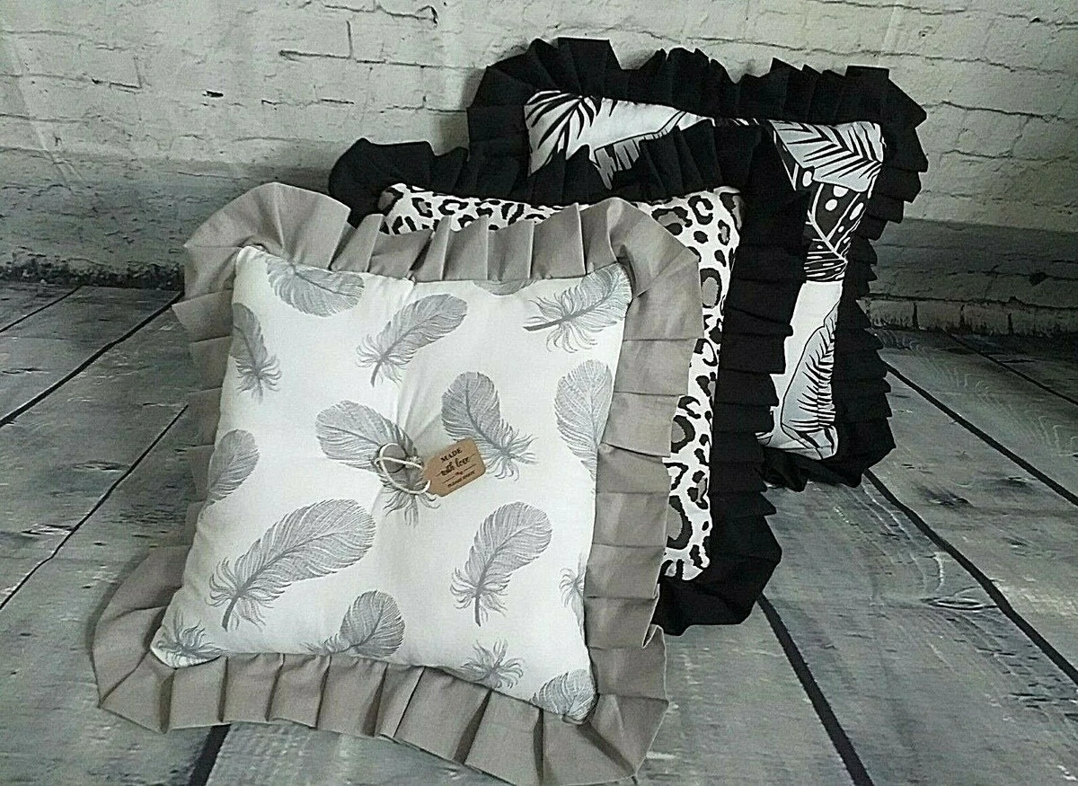 Grey feather pillows top