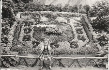 Vintage photo pretty girl fashion in front of flower clock Zittau snapshot 1959 GDR