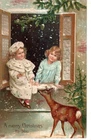 ANTIQUE EMBOSSED CHRISTMAS Postcard     DEER WALKING UP TO TWO GIRLS IN WINDOW