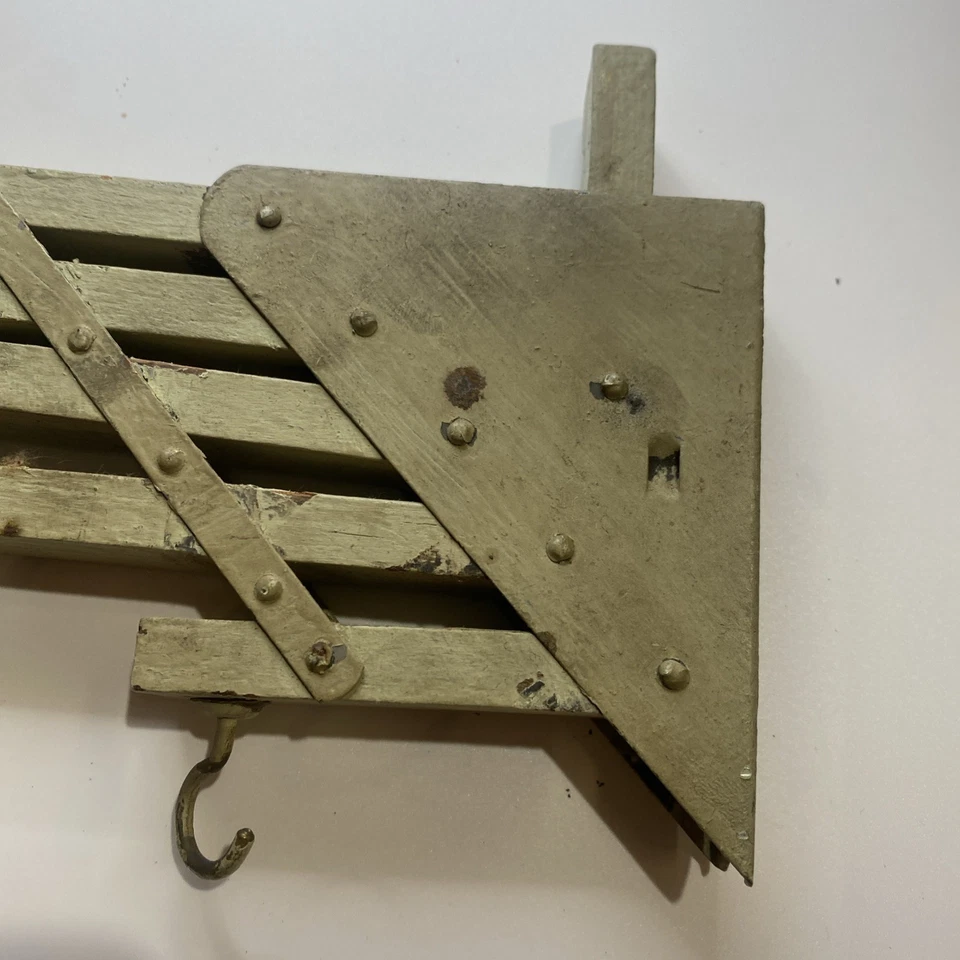 Holdsmore Antique Wood and Metal Folding Rack with 5 Hanger Arms and Hooks, 1921 - Image 4 of 4