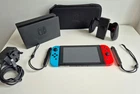 Nintendo Switch Handheld Console 32GB with Neon Blue/Red Joy-Con (Bundle)