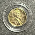 1943 Wheat Penny Plated in 24k Gold in a plastic holder with COA