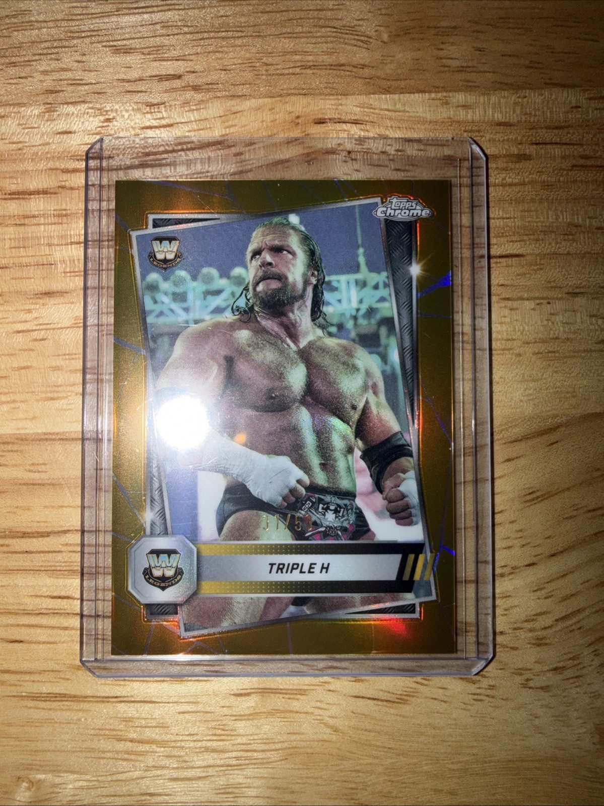 2025 Topps Chrome WWE Triple H #22 Gold Refractor /50