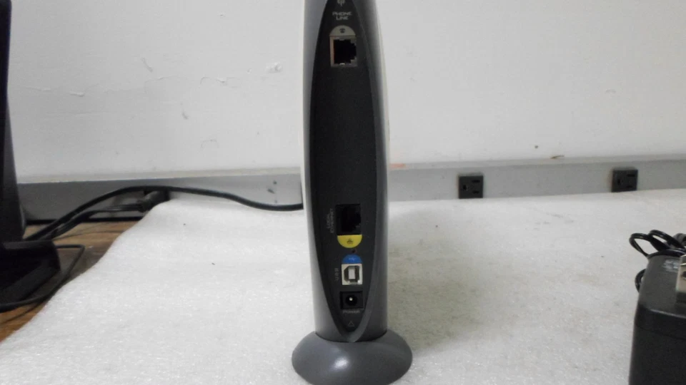 Módem DSL externo USB/Ethernet 1000HG HomePortal de 2 cables con Wi-Fi 802.11b/g Foto 3 de 4