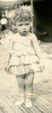 VERY YOUNG CIRCUS PERFORMER IN COSTUME. SILVER PRINT, 1920-40s.