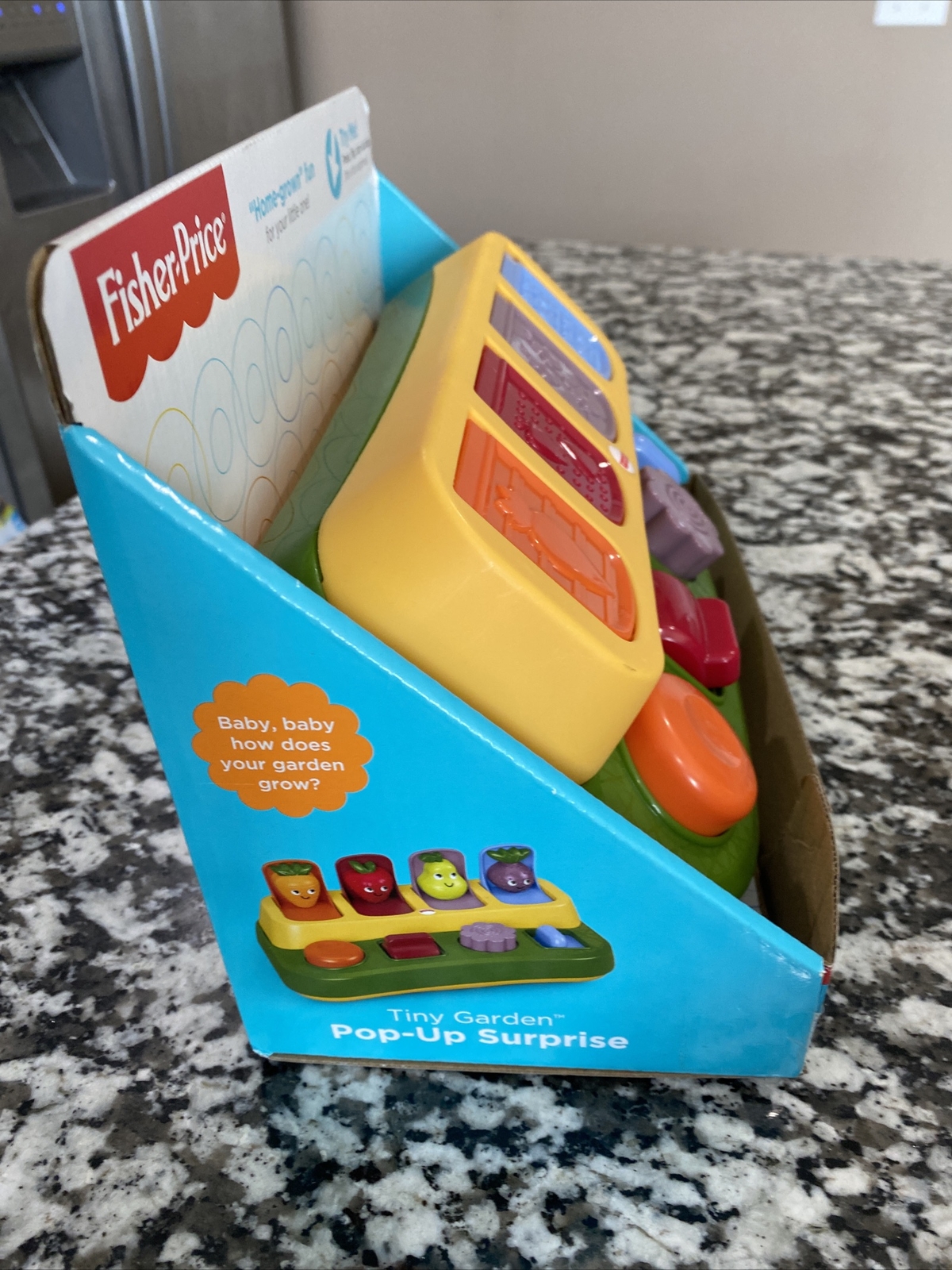 fisher price tiny garden pop up surprise