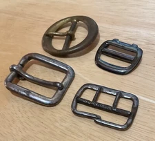 4 vintage misc. belt buckles