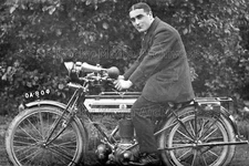 vnn-95 Man on Triumph Single Cylinder Motorcycle. Photo