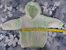 Baby boy's hand knitted green and white marble cable hooded jacket
