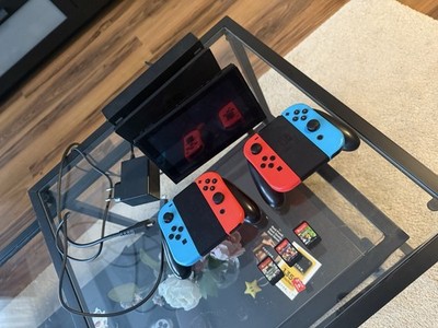 Nintendo Switch Konsole mit Joy-Con - Neon-Rot/Neon-Blau/Grau