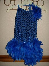 Two Dance Costumes One Blue with Feathers Reg. small One Green with Gold Sequi