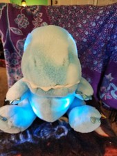FAO SCHWARZ GLOW BRIGHTS - ALIVE WITH SOUND LIGHT 12" BLUE DINOSAUR