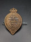 BRITISH ARMY CAP BADGE. CARNARVONSHIRE VOLUNTEER REGIMENT. MILITARY WW1 ANTIQUE