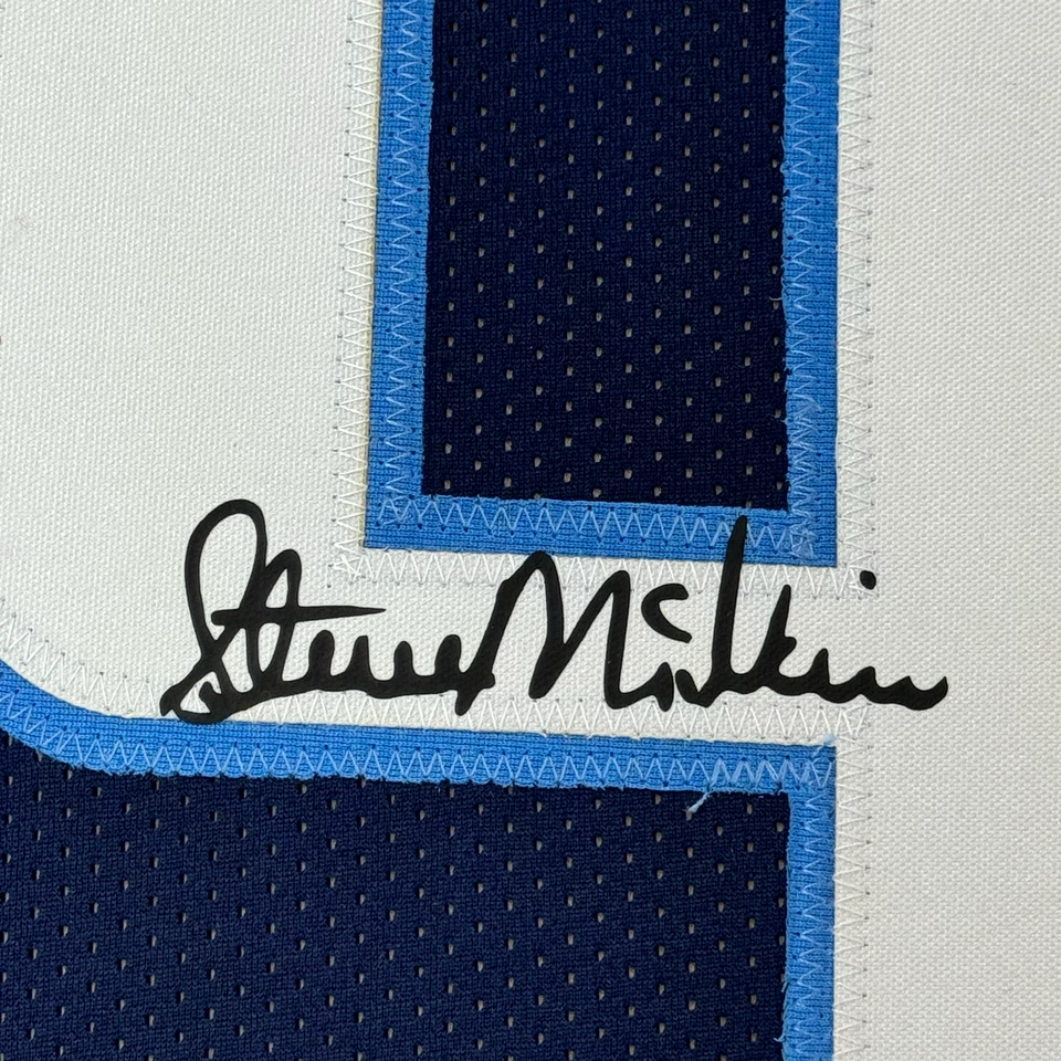 Camiseta reimpressão azul emoldurada fac-símile autografada Steve McNair 35x39 Tennessee - Imagem 2 de 2