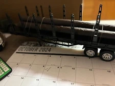NEW RAY BLACK NEW LOG HAULER TRAILER, NO PACKAGING #B 680