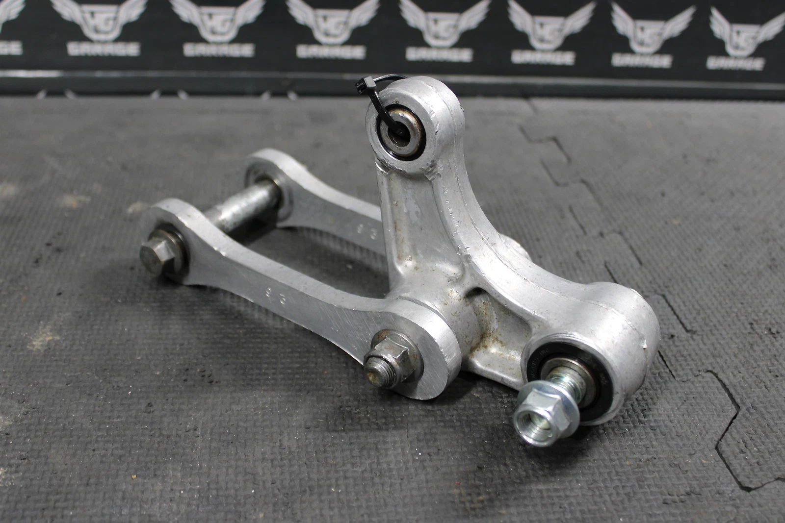1995 KAWASAKI KX125 KX250 OEM REAR SHOCK SWINGARM LINKAGE PIVOT
